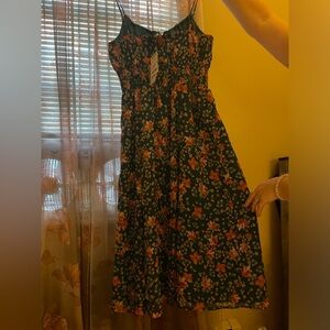 This dress from Patrons of Peace never worn a size small with green pink colors.